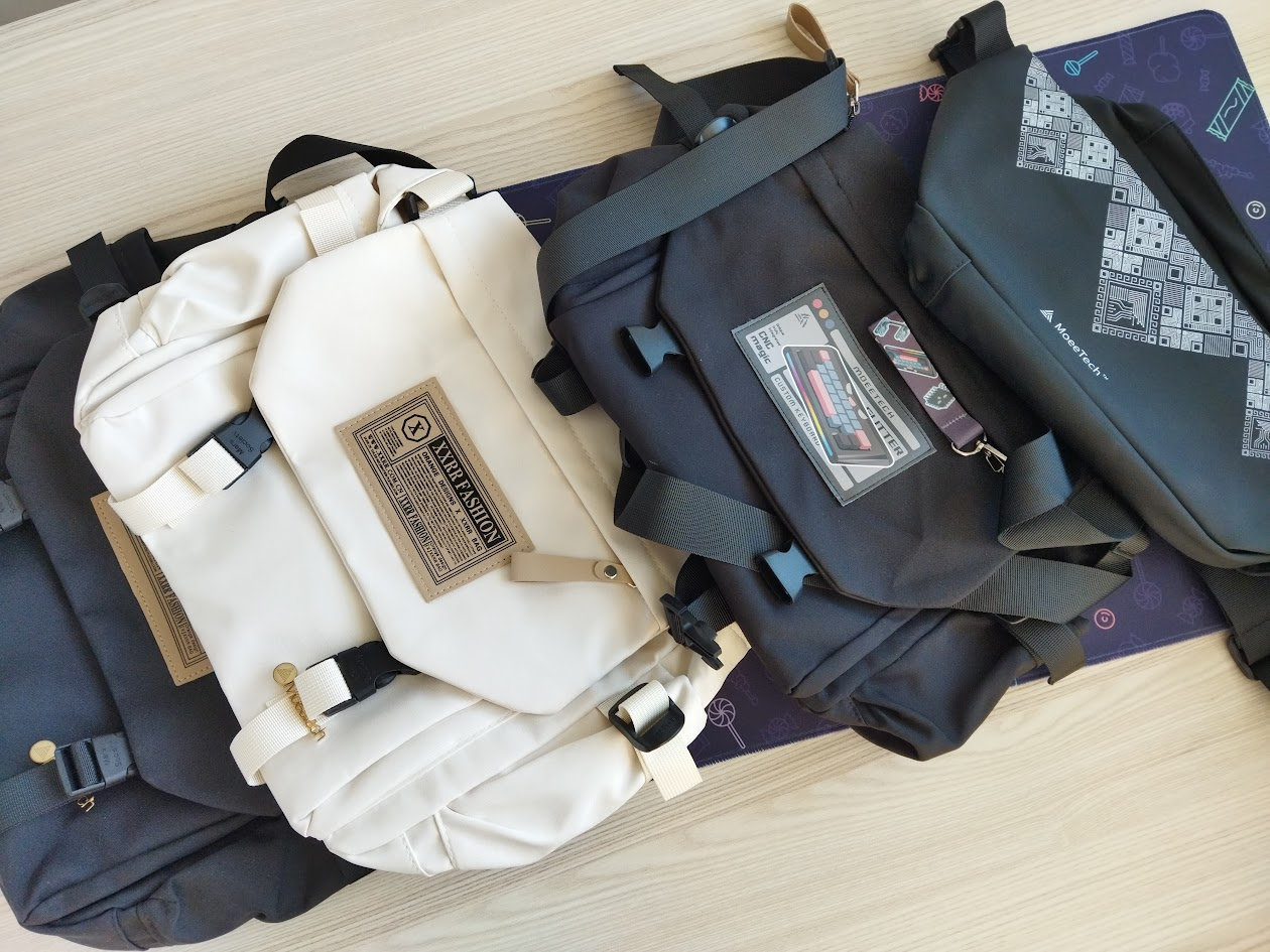 Pic: Left to right: the original color-matched R1 bags, updated R1 bag, and the new HE bag